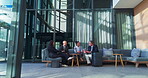 Business people, meeting and suitcase in lobby for collaboration, planning and discussion with diversity. Corporate, travel and waiting room conversation for networking, clients and industry contact