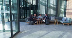 Business people, meeting and networking in lobby for collaboration, planning and discussion with suitcase. Corporate, travel and waiting room conversation for diversity, clients and industry contact