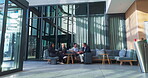 Business people, meeting and diversity in lobby for collaboration, planning and discussion with suitcase. Corporate, travel and waiting room conversation for networking, clients and industry contact