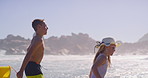 Bucket, race and running with children on beach together for holiday, travel or vacation in summer. Energy, family or race with sibling brother and sister kids at ocean or sea of tropical island