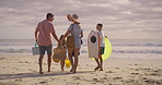 Beach, holding hands and walking with family on sand together for picnic in summer holidays. Nature, travel or vacation with mother, father and children by ocean or sea for weekend bonding from back