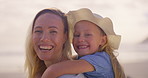 Piggyback, mom or face of happy girl at beach on holiday for travel as family for love or joy. Portrait, child or mother with kid at sea on vacation together with smile, peace or bonding in Greece