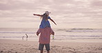 Piggyback, man and child on beach for travel, adventure and flying fantasy on family vacation. Back, father and daughter at ocean for airplane game, freedom and happy memories on California holiday