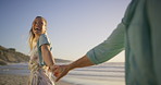Beach, couple and holding hands with woman laugh and smile from holiday and outdoor date. Sea, travel and spin on vacation with joke, journey and love together on anniversary or honeymoon in Bali