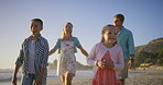 Parents, siblings or happy kids at sea walking on holiday or fun travel with boy, girl or family. Talking, mom or dad with children at beach on vacation together for wellness, joy or nature to relax