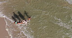 Above, parents and walk with kids on beach for summer vacation, tropical journey and bonding together. Family, holding hands and love for ocean water of holiday fun, calm morning and travel adventure