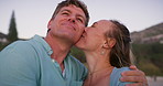 Mature couple, kiss and outdoor with love for travel, journey and commitment on vacation. Happy man, woman and excited in nature for anniversary, milestone holiday and healthy marriage in California
