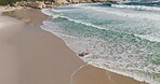 Above, family and children walk on beach for summer vacation, tropical journey and bonding together. Parents, holding hands and love with ocean water of holiday fun, calm morning and travel adventure