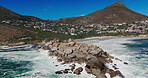 Landscape, waves and drone with beach and mountains for environment, travel destination and tropical. Summer vacation, water and nature with city and ocean for coastline, holiday and paradise