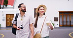 Couple, smile and travel with holding hands in city for sightseeing view, urban tourism and bonding together. Happy, people and walking for vacation, morning commute and romantic adventure of getaway