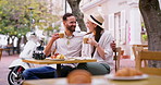 Coffee date, couple and drink, laugh and joke for bonding at outdoor table for holiday. Man, woman and cafe with relax, communication and talk with love, care and restaurant conversation for travel