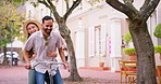 Date, bike and summer with couple, smile and together on street in town for travel. Man, woman and cycling with tourist, holiday and fun for eco friendly city sightseeing with adventure bonding