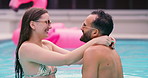 Swimming pool, happy and couple on holiday, laugh or hug outdoor for connection on vacation. Smile, man and woman in water with swimsuit for romantic love, spinning and playful dance on date to relax