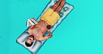 Book, cocktail and float with man in swimming pool from above to relax on holiday or vacation. Reading, summer and wellness with person on inflatable with mockup space for break or leisure at resort