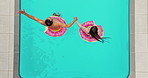 Tropical, love  or couple jumping in swimming pool for holiday, summer vacation or top view. Home backyard, inflatables or people holding hands for support for travel, hotel or honeymoon in Australia