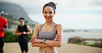Arms crossed, runner and smile with face of woman in nature for marathon race, exercise and health. Workout, wellness and cardio with person training at park for sports athlete, challenge and fitness