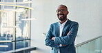 Arms crossed, face and smile of business black man in convention center for career or upskill development. Conference, corporate and happy with confident African employee at tradeshow for opportunity