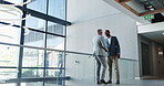 Handshake, meeting and partnership with business people in hallway of convention center for friendly greeting. Deal, hello and welcome with employee people shaking hands at conference for development