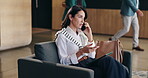 Business, phone call and tablet with woman in office lobby for communication or problem solving. Chair, conversation and research with serious mature employee in workplace for negotiation or update