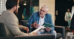 Documents, meeting and tablet with business people in lobby of office for discussion or planning. Chair, collaboration and conversation with employee people in workplace for report or research