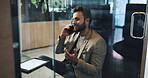 Business, phone call and thinking with man in office for communication, planning or research. Communication, corporate and tablet with employee in pod at workplace for mobile negotiation or update