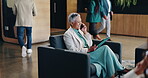 Business, phone call and tablet with woman in lobby of office for communication or planning. Chair, conversation and research with happy mature employee in workplace for negotiation or update