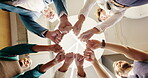 Business, people and hands with fist bump in circle for company team building, solidarity and collaboration. Low angle, employees and happy with workplace integration, synergy and support in office