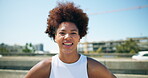 Tired, woman and face with fitness in city for pride, exercise break and cardio of sports recovery. Portrait, African person and rest with smile, workout fatigue and performance progress for marathon