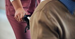 Hands, caregiver and person with disability, nursing home or senior care for patient in wheelchair. Healthcare, medical professional and helpful for rehabilitation in clinic, nurse or assisted living