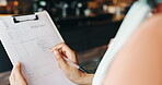 Hands, owner and writing with document in coffee shop for inventory, stock or ingredients. Order, paperwork or person planning checklist in cafe with notes for procurement, tea or price at restaurant