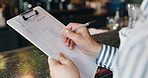 Hands, manager and writing with document in coffee shop for inventory, stock and ingredients. Person, paperwork and planning checklist in cafe with notes for procurement, tea and price at restaurant