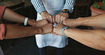 People, fist bumps and cafe with support, teamwork and friendly service with hospitality. Group, barista and employees in coffee shop, hand gesture and cooperation with hands and 