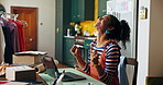 Woman, laptop and excited for small business, success and creative fashion boutique startup with online sales. Designer, owner and celebration for store order, retail service and ecommerce delivery