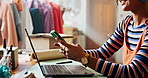 Woman, smartphone and order for small business, clothes and creative fashion boutique startup with online sales. Designer, owner and distribution for store social media, service or ecommerce delivery