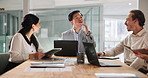 Collaboration, meeting and planning with business people in boardroom of office together for strategy. Documents, laptop and tablet with employee team in workplace for seminar, training or workshop