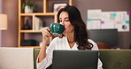 Laptop, remote work and woman drinking coffee in home, laugh and check engagement results. Computer, tea and happy freelancer on sofa for funny joke, comedy and social media marketer with meme online