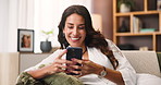Happy, browsing and woman with smartphone, home or reading ebook on website, online or living room. Chilling, reader and person with mobile for entertainment, smile or tech for digital novel in house