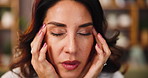 Headache, stress and woman on sofa in home with brain fog, fatigue or hangover recovery. Exhaustion, mental health and female person with temple massage for pain, tired or burnout in apartment.
