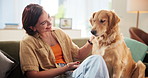 Home, girl and pet dog on sofa for animal care, connection or domestic companion. Loyalty, happy owner and golden retriever in living room with stroke, playing and scratch for bonding, relax and love