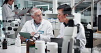Healthcare, scientist and colleagues with tablet, teamwork and people with medical research for treatment. Pharmaceutical, collaboration and specialist with tech for info and ideas for breakthrough