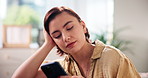 Woman, relax and scroll with phone at house for browsing social media, messages and notification. Person, rest and mobile app for reading ebook, online search and download game of entertainment break