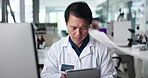 Scientist, man and tablet at laboratory in study, test or review for sample in pharmaceutical development. Person, computer and clinical trial for medical research, insight or solution for results