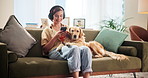 Home, dog or woman with phone for music, podcast or bonding with domestic pet on sofa. House, animal or golden retriever with female person for mobile, audio track or headphones for listening to song