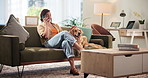 Home, dog and woman with phone call for conversation, smile and bonding with domestic pet on sofa. House, animal and golden retriever with female person for mobile, communication or chat with contact