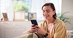 Smile, woman and relax with phone at house for browsing social media, messages and notification. Person, rest and mobile app for reading ebook, online search and download game of entertainment break