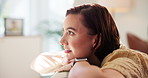 Woman, happy and thinking of memory in home with nostalgia, daydreaming and comfortable on sofa. Peaceful, person and smile in living room with weekend break, remember and perspective with wondering