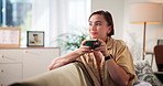 Couch, woman and thinking with coffee to drink, comfortable and happiness with espresso at home. House, female person and chilling in morning for warm cappuccino, caffeine and relax in living room