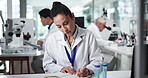 Science, test tube and writing with woman in laboratory to record breakthrough, discovery or findings. Healthcare, medical and research with scientist at work on clinical trial for innovation 