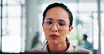 Serious, employee and woman with glasses, computer and receptionist with tech, online and administration. Typing, secretary and person with eyewear in business, research and planning for project