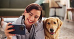 Woman, dog and selfie with smile, floor and love in home, loyalty and care with post on social network. Girl, animal and pet labrador with profile picture, photography and happy for memory in lounge